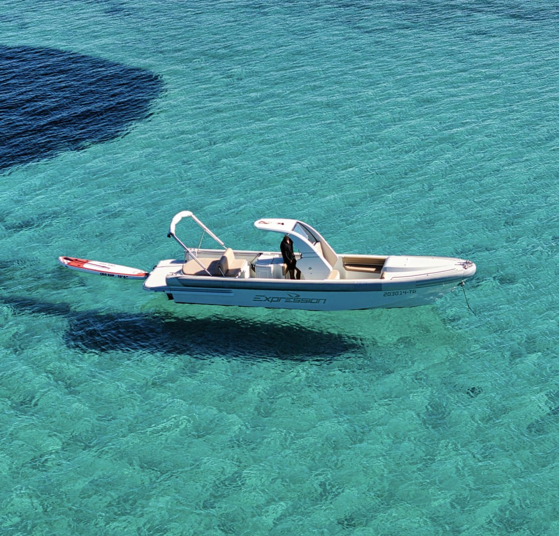 Expression speedboat anchored over crystal-clear turquoise Adriatic water